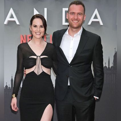 Jasper Waller Bridge and his fiance Michelle Dockery in black dress attending Anatomy of a Scandal.. 
